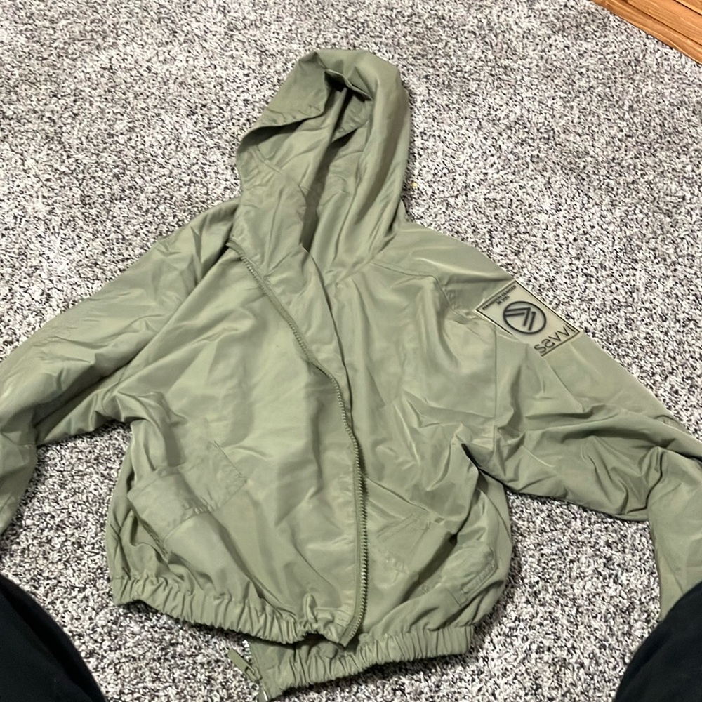 Green raincoat